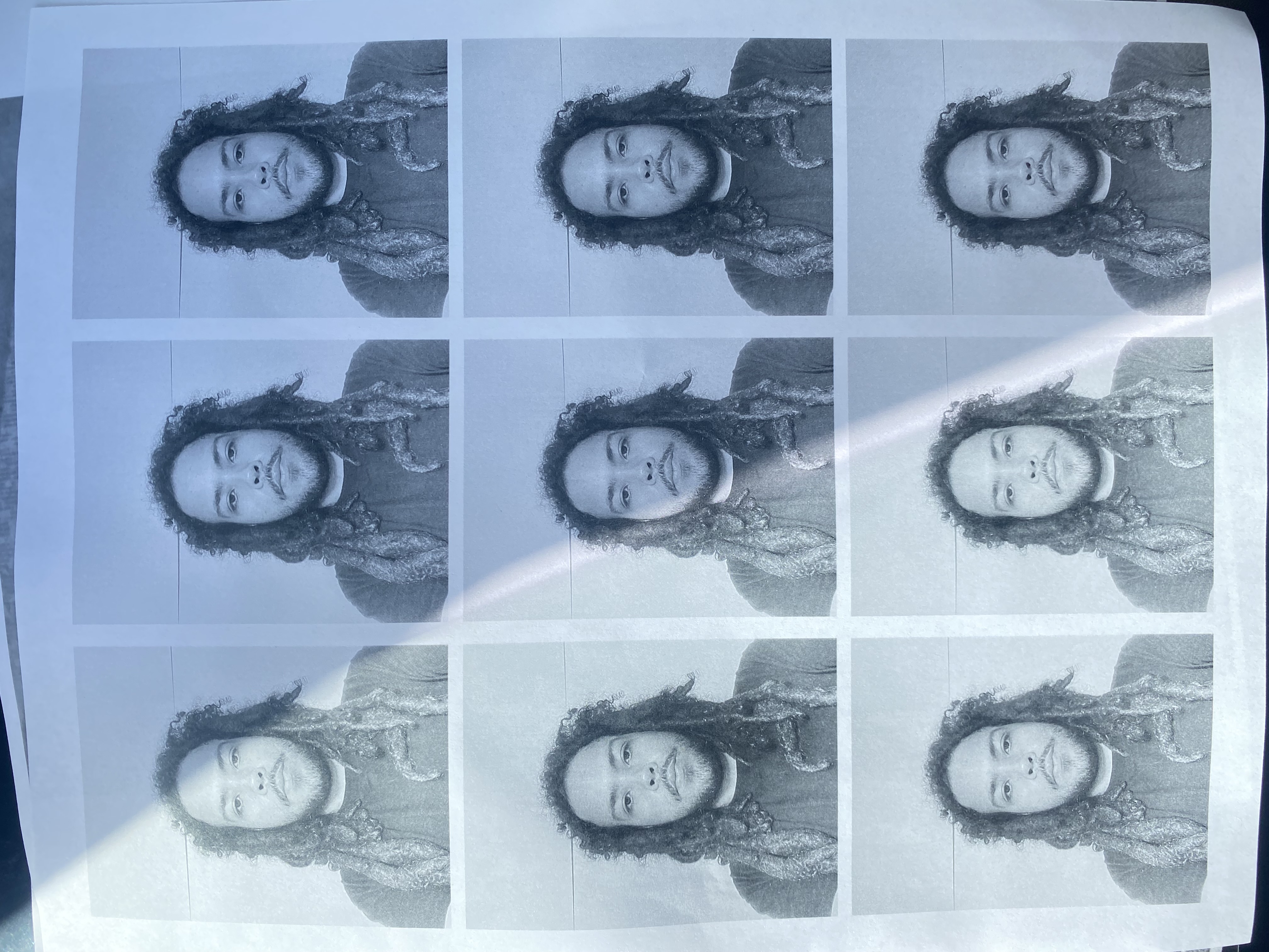 Blue-toned sheet of repeated portraits of Jazz